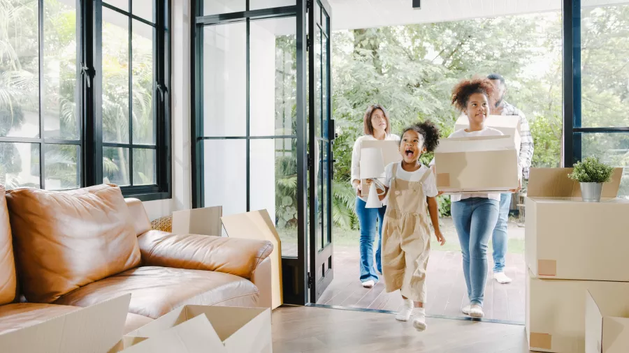 Family moving into their new home.