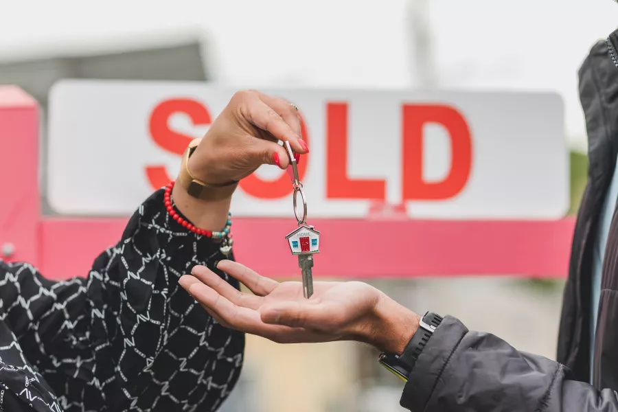 Agent Shaking Hands with Client