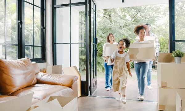 Family moving into their new home.